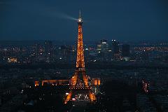 
Evening Lights On Eiffel Tower With La Defense Behind From Montparnasse Tower
